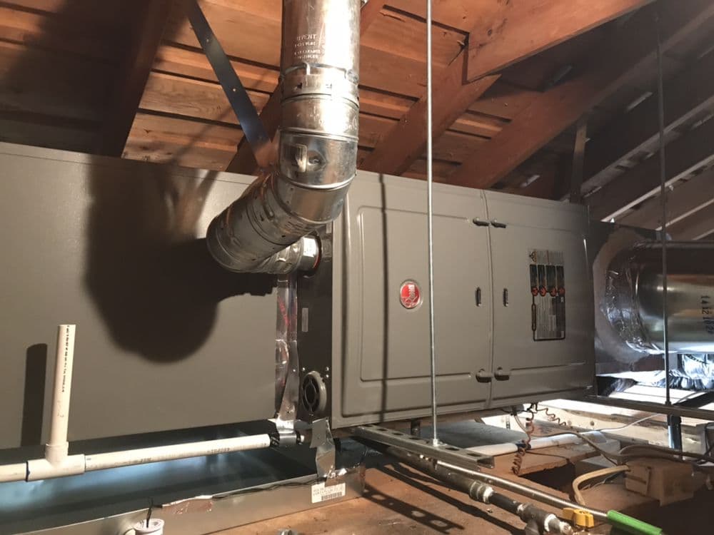 Rheem furnace installed in an attic by NextGen with new double-wall venting